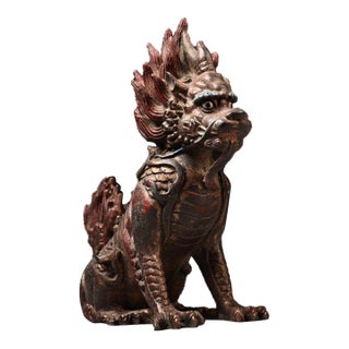 Gilt Bronze Qilin Statue With Cinnabar Accents For Sale