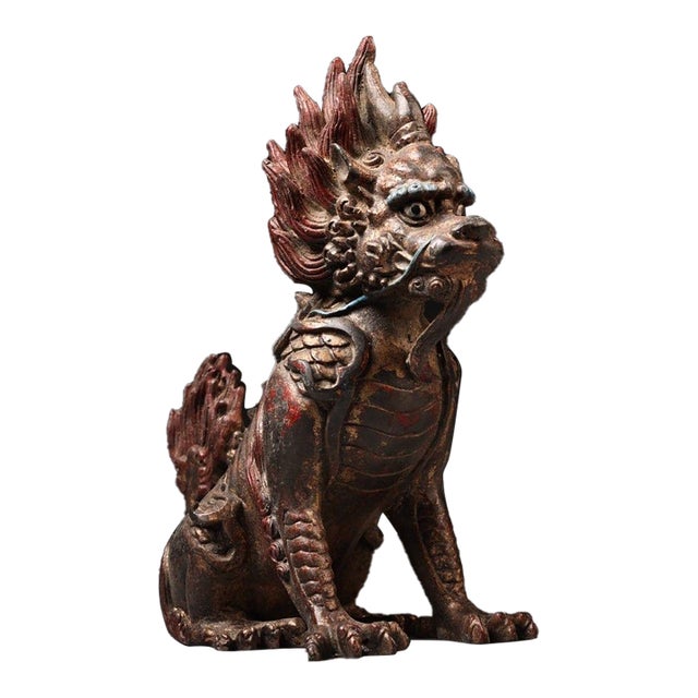 Gilt Bronze Qilin Statue With Cinnabar Accents For Sale