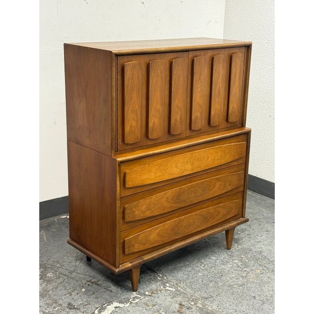 Design Plus Gallery presents the Gentleman's Dresser from the Mid 20th Century from American of Martinsville. The...