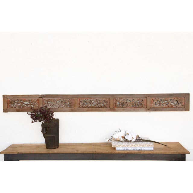 Invite a piece of profound history and breathtaking artistry into your home with this magnificent antique, finely carved...