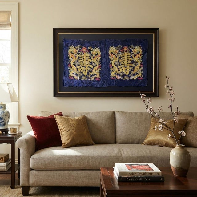 Exquisite vintage Chinese textile featuring rich royal blue silk embroidered with metallic gold couched threads. The dual-...