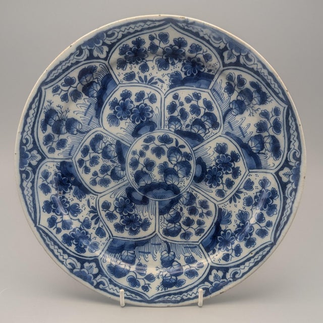 Tin-glazed earthenware plates manufactured by De Witte Ster factory, circa 1740. Dimensions: Approximately 10⅜” diameter....