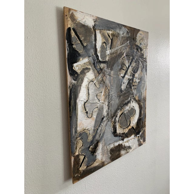 Mixed media composed of a destroyed copy of On Death & Dying, Elisabeth Kübler-Ross's famous seminar on death, life, and...