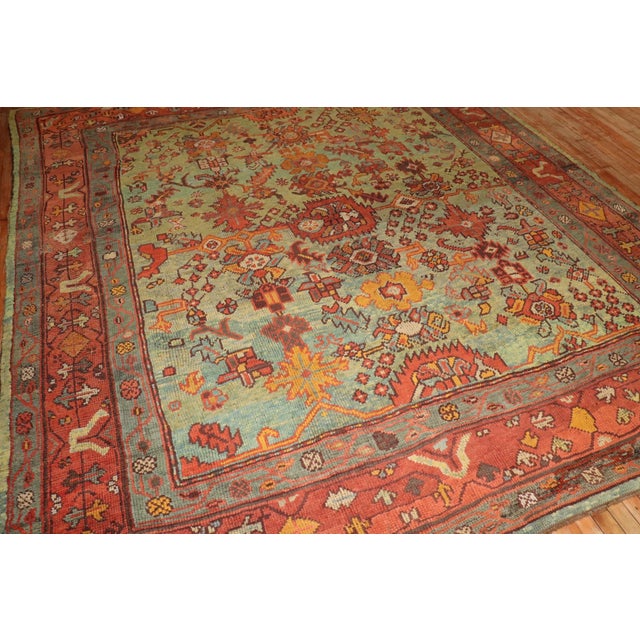A square size green ground Antique Oushak Carpet from the 1900's