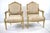 Pair of Antique Louis XVI Arm Chairs, wooden frame that shows detail wood carving all around the chair. Wooden frame is in...