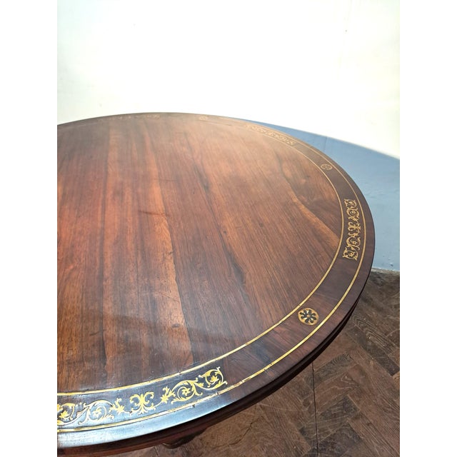 Regency Rosewood Centre Table with Brass Inlay, 1820, in Good conditions. Designed before 1890