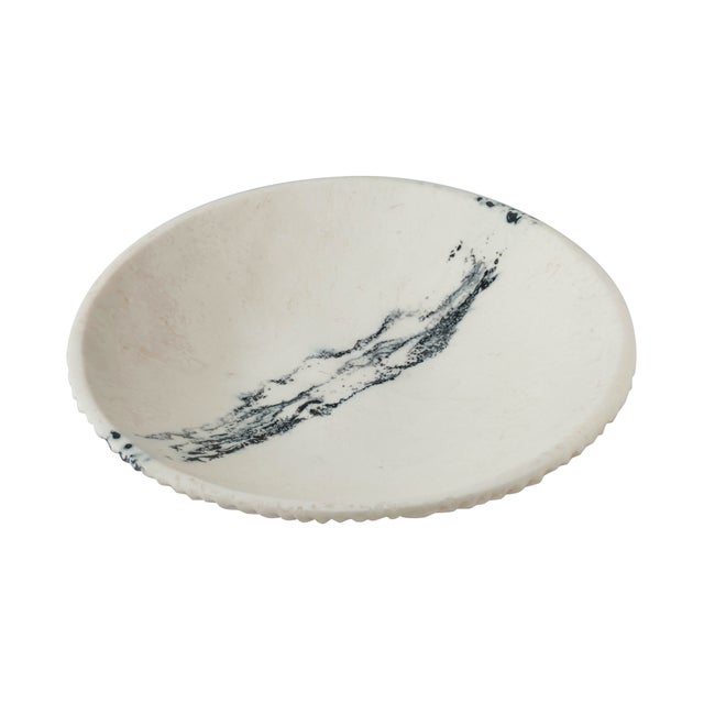 Organic swirls of black against a white resin base give the Ikani Serving Plate its striking, marble-like effect. Both...