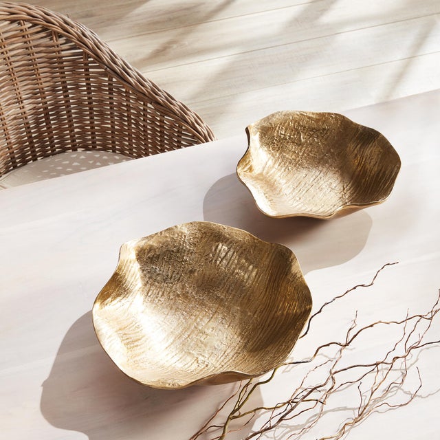 With flowing, wispy forms you, d never know this set of decorative bowls are made of a sturdy cast aluminum. Perfect for...
