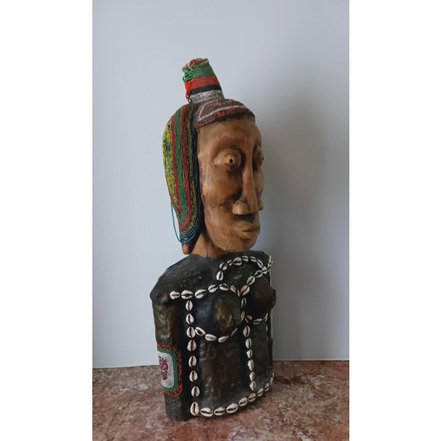 A rare find. This magnificent piece from early 20th century West Africa will make a wonderful acquisition for the savvy...