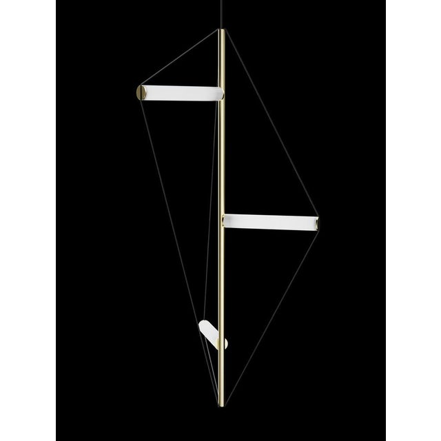 Ceiling lamp with brushed brass structure and frosted light tubes kept together by three elastic wires. European Plug (up...