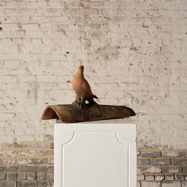 Add a unique architectural element to your collection with these 19th century French terracotta roof tiles, each featuring...