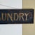 Early 20th Century Antique Large "The Red ★ Laundry" Horizontal Wood Sign With Gold Whimsical Lettering & Red Star For Sale - Image 4 of 17