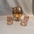 A vintage gold gleck cocktail martini pitcher and 4 roly poly glasses perfect addition to your vintage barware collection....