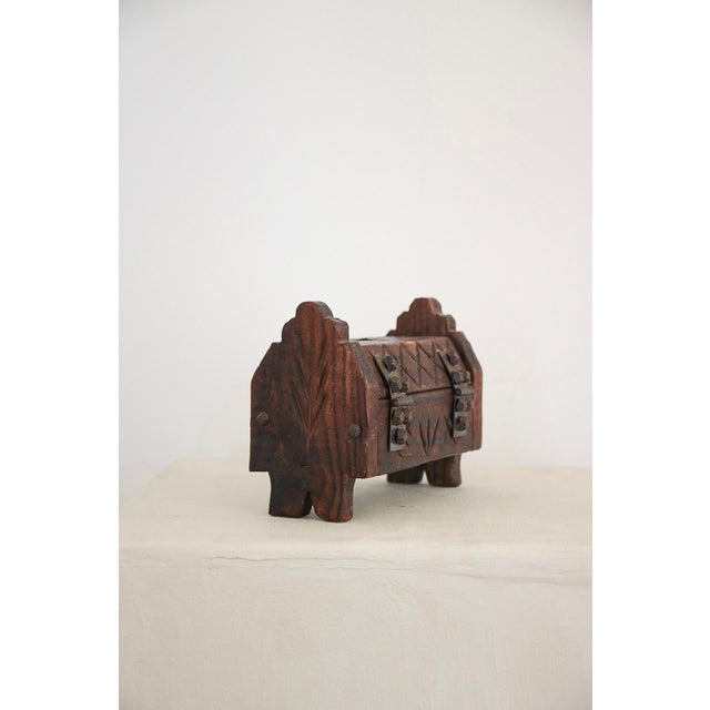 Vintage carved wood hinged box. Reminiscent of Dutch folk art.