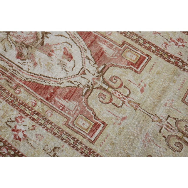 An early 20th century muted Turkish Ghiordes wide runner. Measures: 3'11" x 12'10".