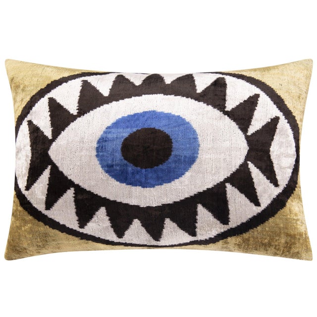 Striking Evil Eye Design: This 16x24-inch throw pillow features a bold and artistic evil eye pattern, perfect for creating...