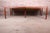 An exceptional mid-century modern extension dining table in book-matched walnut By Edward Wormley for Dunbar Furniture...