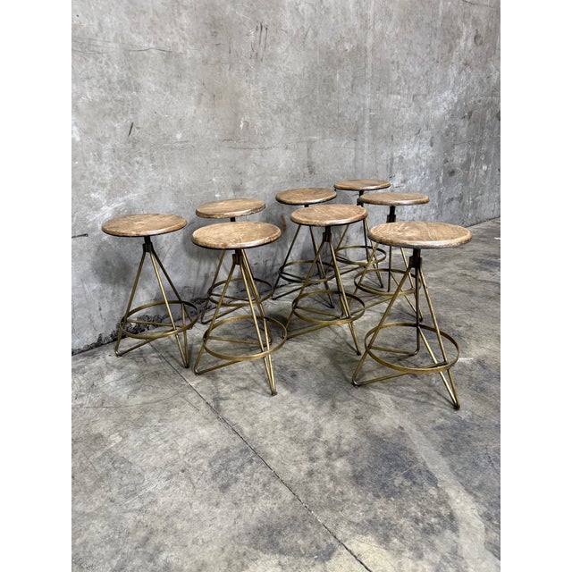 2010s Arteriors Wyndham Swivel Counter Stools Set of 8 Natural Wax Wood Vintage Brass For Sale - Image 5 of 10