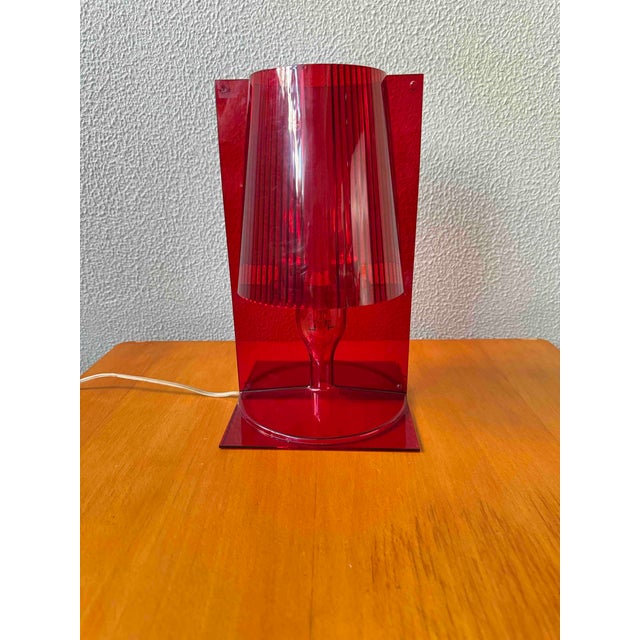 Designed by Ferruccio Laviani for Kartell in 2003, the Take table lamp is a defining example of Kartell’s early 21st-...