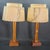 A staple of Tiki or Hollywood Regency styles, this vintage pair of lamps feature bamboo rattan bodies with square bases...