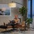 The Stretch 75" Arc Lamp is a modern arc lamp designed by Kirby Groce in 2011, featuring a sleek black steel arm and a...
