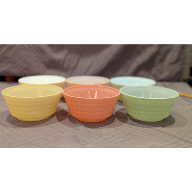 A highly collectible set of six vintage 5-inch cream soup bowls (frequently used as cereal, dessert, or berry bowls today)...