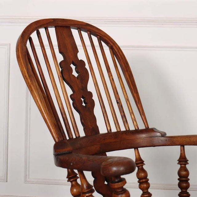 19th C Yorkshire broad arm windsor chair. 1850. This piece is designed in the style of the selected designer and/or...
