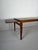 Classic Danish coffee table dating from the 1950s/60s, finished in teak veneer. Its minimalist form, slender tapered legs...