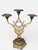 Elegant antique candlesticks dating to the late 19th–early 20th century, a period when Art Nouveau and Beaux-Arts...