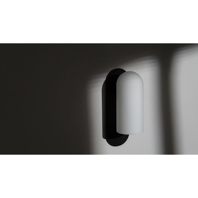 Serenely emitting light, while projecting its form. The distinctive Odyssey globe is reflected in this fixture by a...