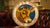 Circular double-sided porcelain advertising sign for the Polk Sanitary Milk Company of Indianapolis, Indiana. The colorful...
