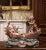 Bring a touch of theatrical Belle Époque charm into an interior with this highly decorative antique French barbotine...