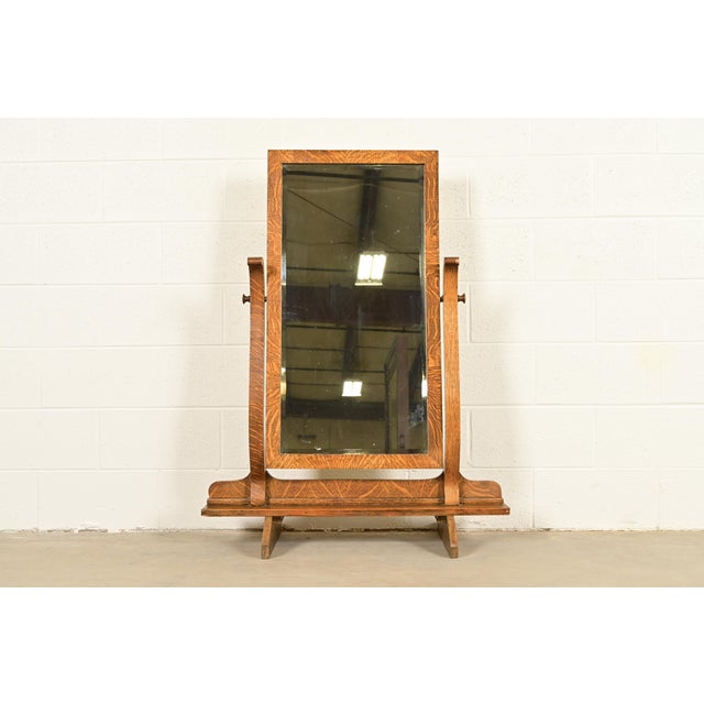 A gorgeous antique Mission or Arts & Crafts tiger oak tilting full length cheval floor mirror In the manner of Stickley...