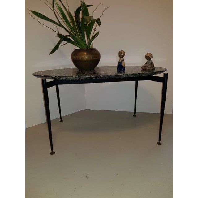 - Elegant little mid-century Italian coffee table - With delicately rounded marble top on filigree metal frame - Precious...