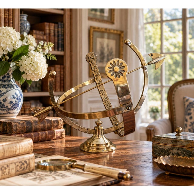 A beautifully crafted brass armillary sphere, evoking the timeless elegance of classical European gardens. Pieces like...