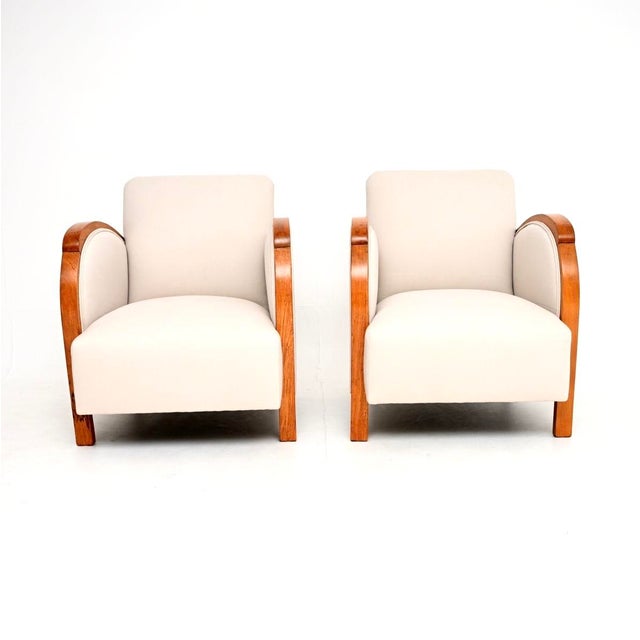 A stylish and very well made pair of Swedish Art Deco armchairs in walnut. They were recently imported from Sweden, they...