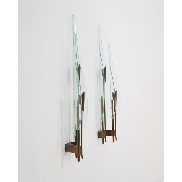 An elegant expression of postwar Italian lighting design, this wall lamp model 1461 reflects the refined visual language...