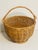 French vintage handmade market basket with a handle and raised bottom rim.