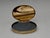 A fine antique Scottish oval snuff or trinket box, formed with a gilt brass mount and inset polished hardstone panels. The...