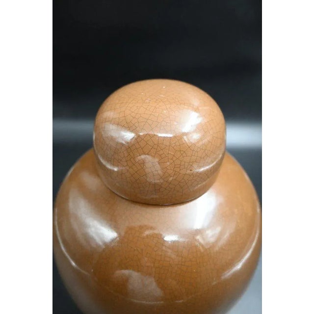 A porcelain lidded jar in a distinct monochrome color No cracks or other defects Height 27 cm