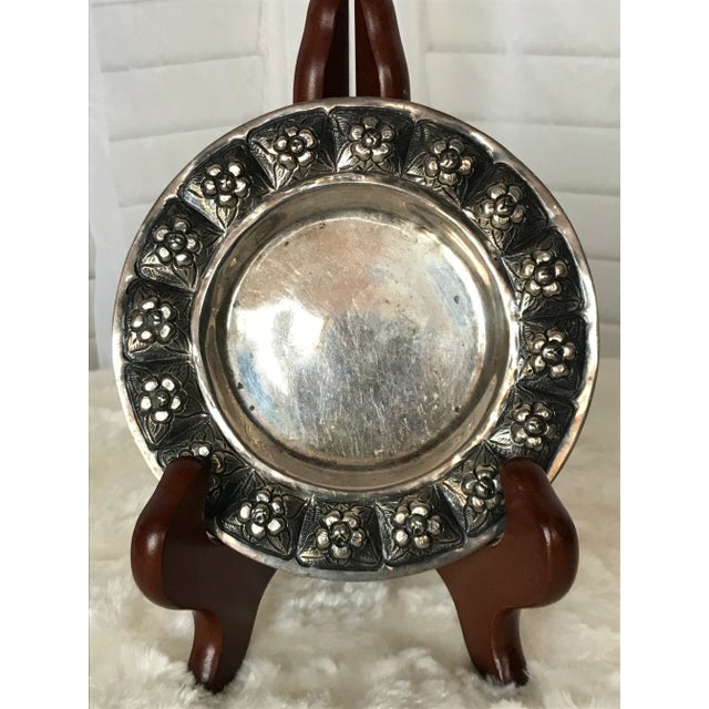 This is a rare piece of sterling by famous mexican silversmith company Sanborn. This beautiful repousse dish measures 4.5...
