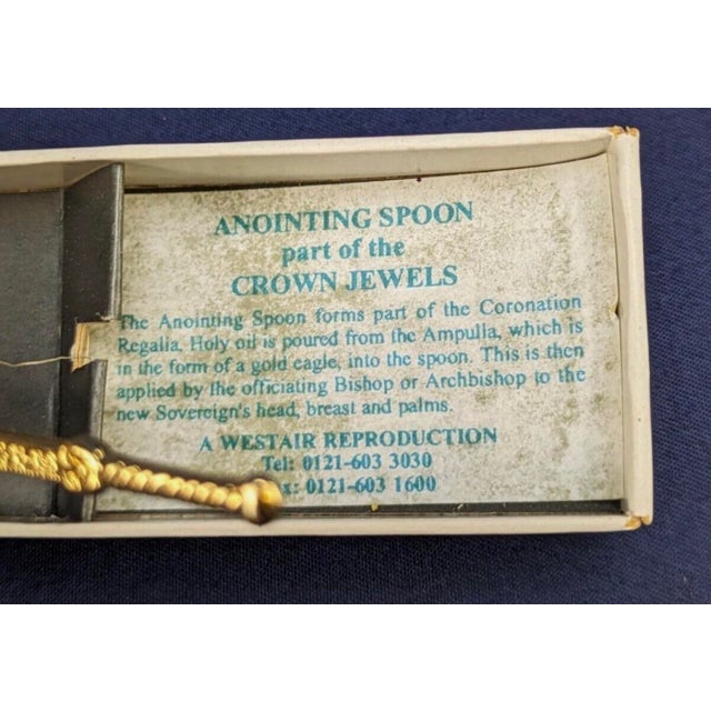 The anointing spoon forms part of the Coronation Regalia. Holy oil is poured from the Ampulla, which is in the form of a...