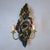 This wall lamp with 2 light points features metal fruit decoration in the shape of grapes, pears, lemons and a...