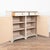 Early 19th century Swedish tall sideboard, crafted in pine and retaining its original painted finish. Fluted carved...