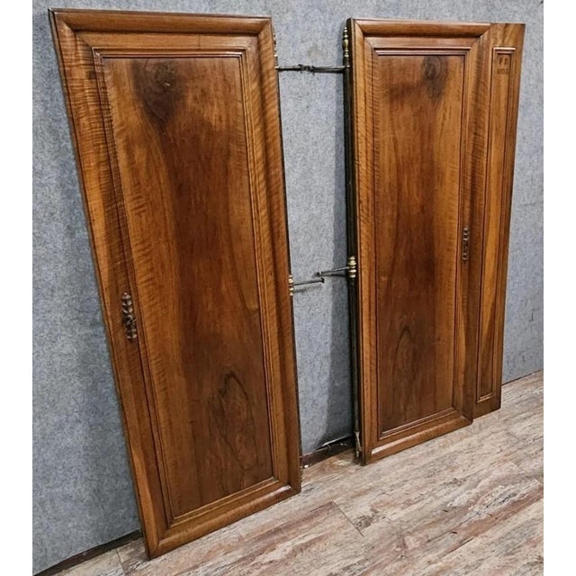 Pair of walnut cabinet doors, dated 1895 / for closet or architectural elements Beautiful late 19th-century joinery,...