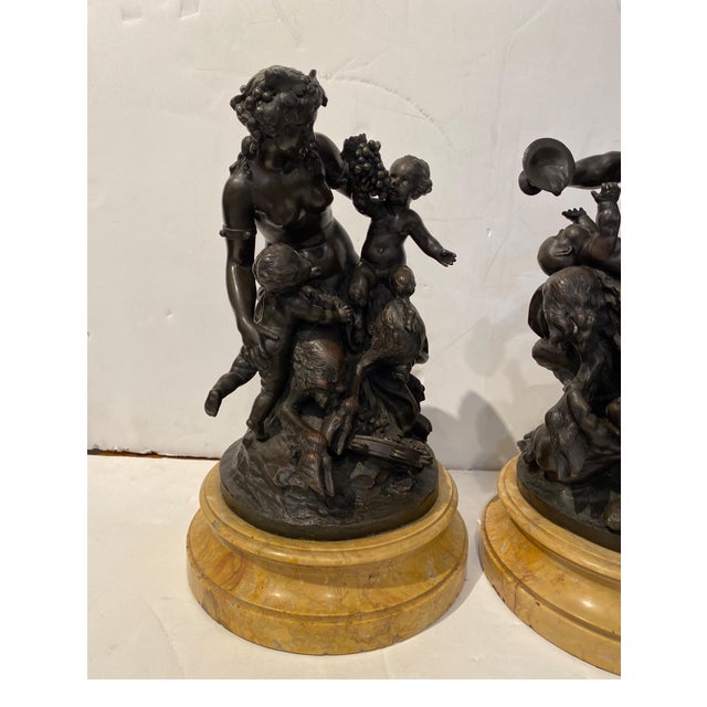 A Pair of 19th Century Grand Tour bronzes after the original sculptor, Claude Michael Clodion. The male and female Satyr...