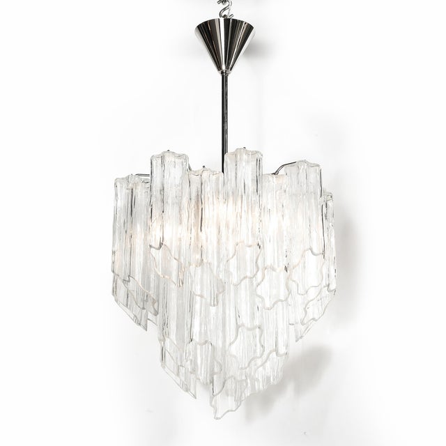 A captivating example of Mid-Century Modernist design, this hand-blown Murano chandelier was crafted in Italy circa 1970,...