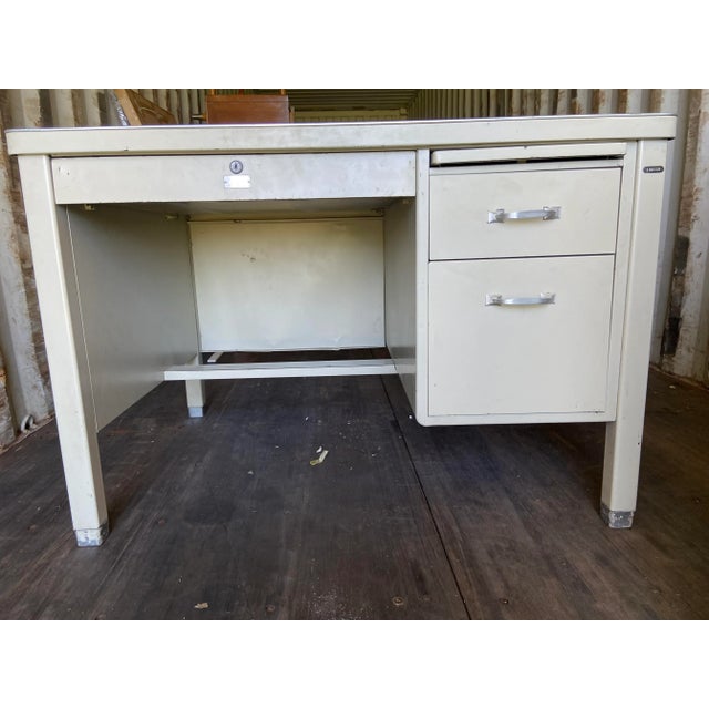 1940’s the general fireproofing company vintage metal tanker desk with faux wood metal top and beige color with filling...