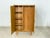 For sale is a beautiful vintage linen cupboard from 1966. The cupboard impresses with its timeless, simple design and...