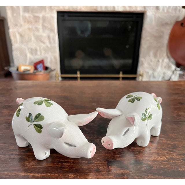 Imported from England. Pair of Plichta clover design hand painted pigs. Plichta pigs are highly collectible ceramic...